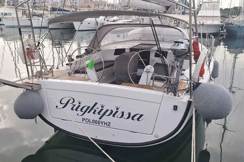  Yacht Photos Pics 2014 Hanse 385 sailboat docked in marina, featuring "Prigkipissa" name on stern.