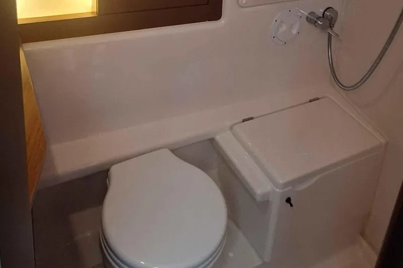  Yacht Photos Pics Compact bathroom in 2014 Hanse 385 yacht with toilet and shower.