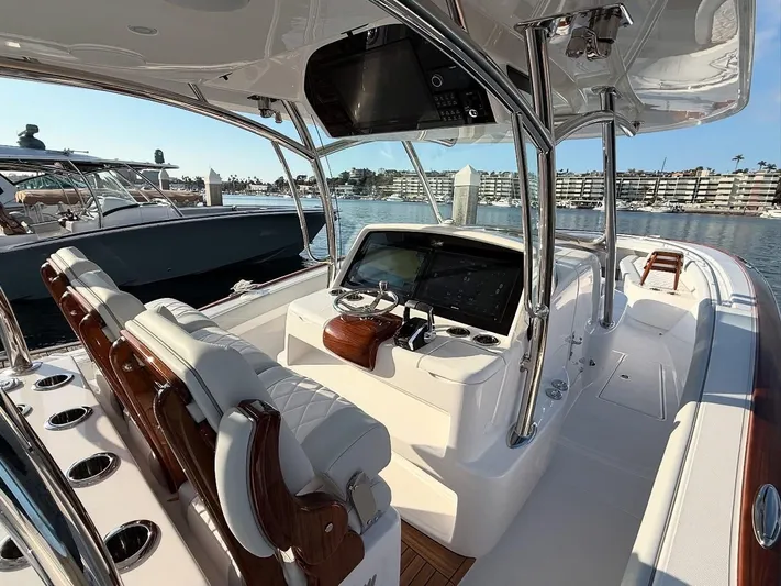  Yacht Photos Pics 2026 Mag Bay 38 CC boat interior with modern helm and luxurious seating.