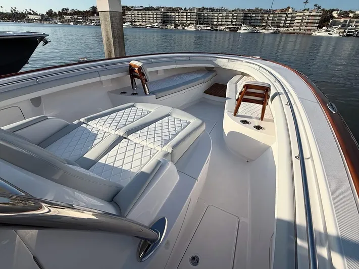  Yacht Photos Pics 2026 Mag Bay 38 CC boat interior with luxurious seating and waterfront view.