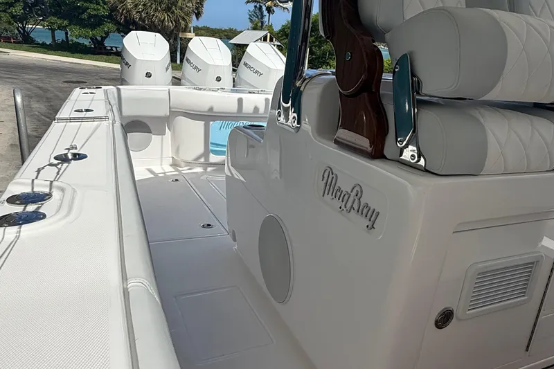  Yacht Photos Pics 2026 Mag Bay 38 CC boat interior with luxurious seating and Mercury engines.