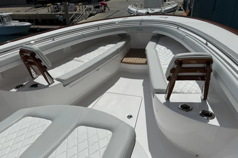  Yacht Photos Pics 2026 Mag Bay 38 CC boat interior with luxurious seating and sleek design.