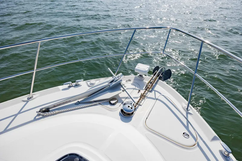 Beautiful Blue Yacht Photos Pics Bow of 2008 Sea Ray 52 Sedan Bridge yacht on open water.