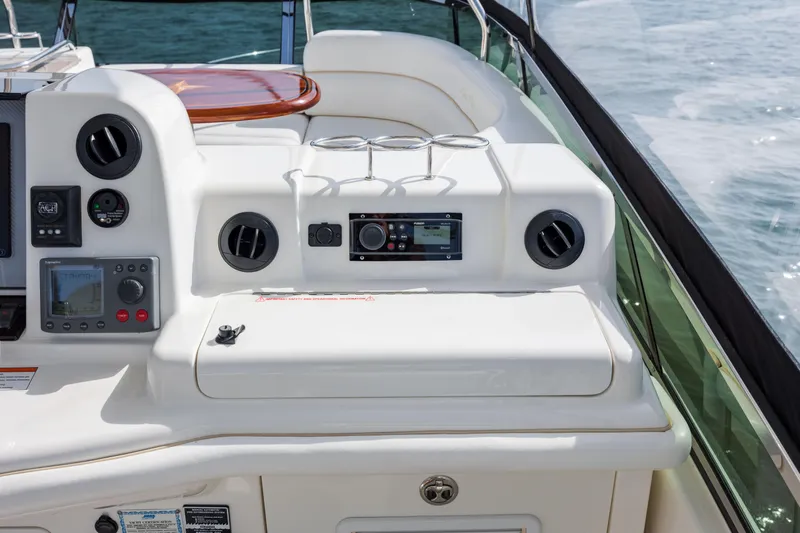 Beautiful Blue Yacht Photos Pics 2008 Sea Ray 52 Sedan Bridge helm with modern controls and ocean backdrop.