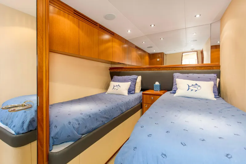 Refuge Yacht Photos Pics Luxurious twin cabin interior of 2007 Hatteras 68 Enclosed Bridge yacht.