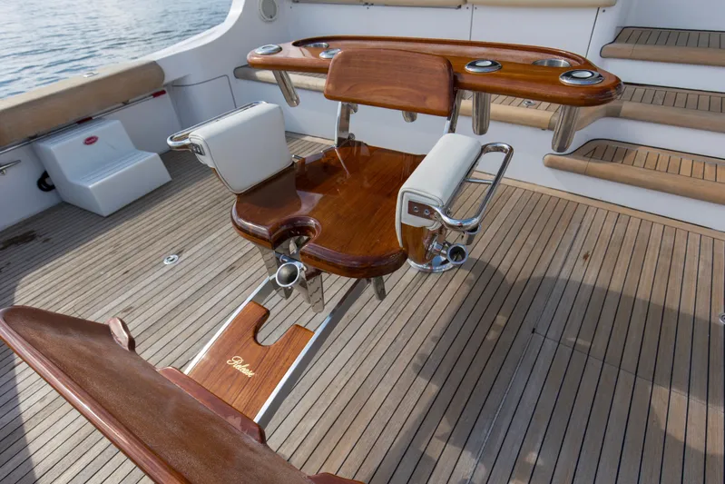 Refuge Yacht Photos Pics Luxury fishing chair on 2007 Hatteras 68 Enclosed Bridge yacht deck.