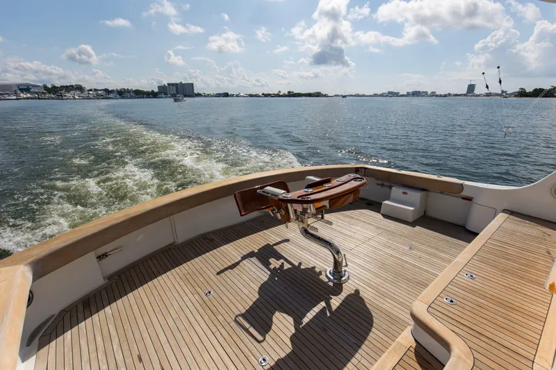 Refuge Yacht Photos Pics 2007 Hatteras 68 Enclosed Bridge yacht deck with scenic water view.