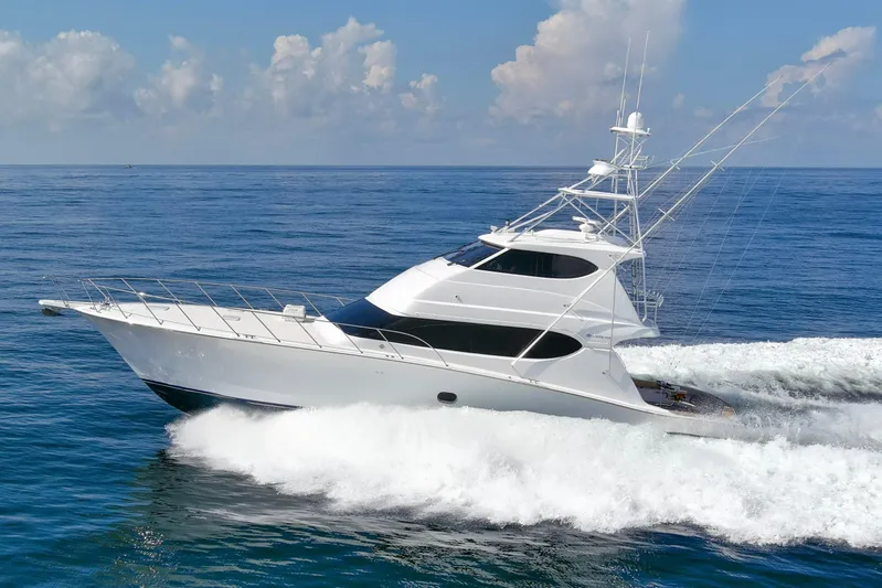 Refuge Yacht Photos Pics 2007 Hatteras 68 Enclosed Bridge yacht cruising on open sea.