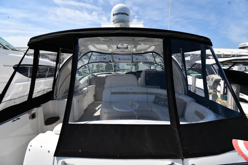 Day Off Yacht Photos Pics 2009 Sea Ray 40 Sundancer yacht with enclosed cockpit and luxurious seating.