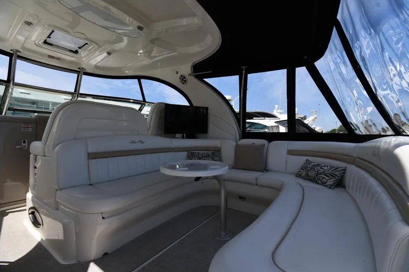 Day Off Yacht Photos Pics Luxurious interior of 2009 Sea Ray 40 Sundancer yacht with plush seating and modern design.