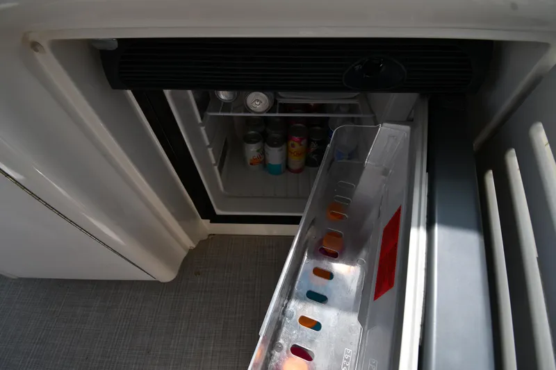 Day Off Yacht Photos Pics Open fridge on 2009 Sea Ray 40 Sundancer yacht, stocked with beverages.