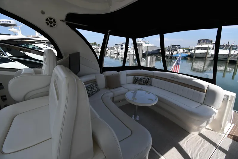 Day Off Yacht Photos Pics Luxurious interior of 2009 Sea Ray 40 Sundancer yacht with marina view.
