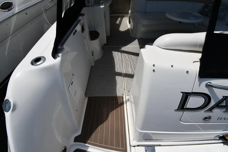 Day Off Yacht Photos Pics 2009 Sea Ray 40 Sundancer yacht interior with seating and deck view.