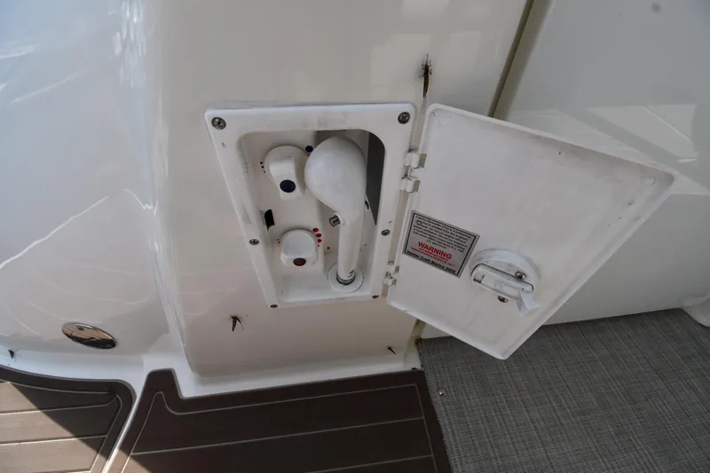 Day Off Yacht Photos Pics 2009 Sea Ray 40 Sundancer boat shower compartment with open hatch and controls.
