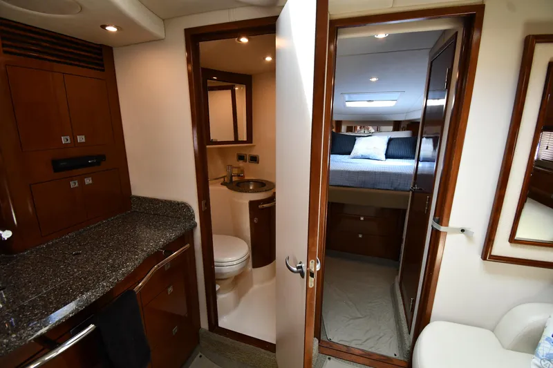 Day Off Yacht Photos Pics Interior of 2009 Sea Ray 40 Sundancer yacht showing bathroom and bedroom.