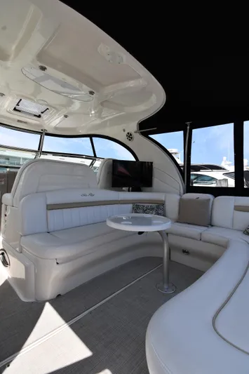Day Off Yacht Photos Pics Luxurious interior of 2009 Sea Ray 40 Sundancer yacht with plush seating and modern design.