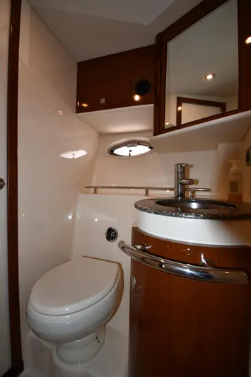 Day Off Yacht Photos Pics 2009 Sea Ray 40 Sundancer yacht bathroom with modern fixtures and wood accents.