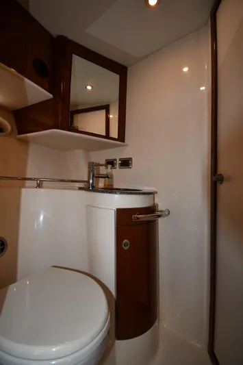 Day Off Yacht Photos Pics Luxurious bathroom in 2009 Sea Ray 40 Sundancer yacht with modern fixtures.