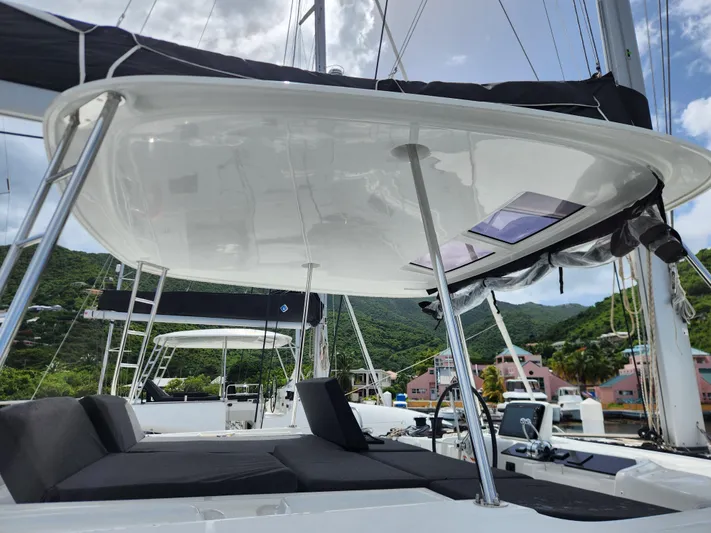 Southern Isle Yacht Photos Pics 2024 Lagoon 46 catamaran with modern design in harbor.