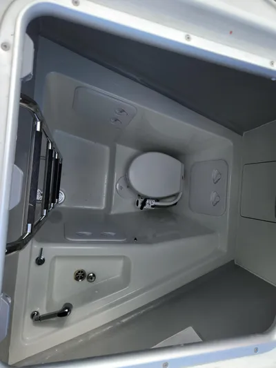 Southern Isle Yacht Photos Pics Interior of a 2024 Lagoon 46 yacht featuring a toilet.