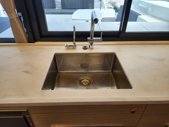 Southern Isle Yacht Photos Pics Modern kitchen in Lagoon 46 catamaran, 2024 model.