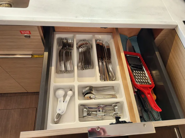 Southern Isle Yacht Photos Pics Cutlery drawer in a 2024 Lagoon 46 yacht.