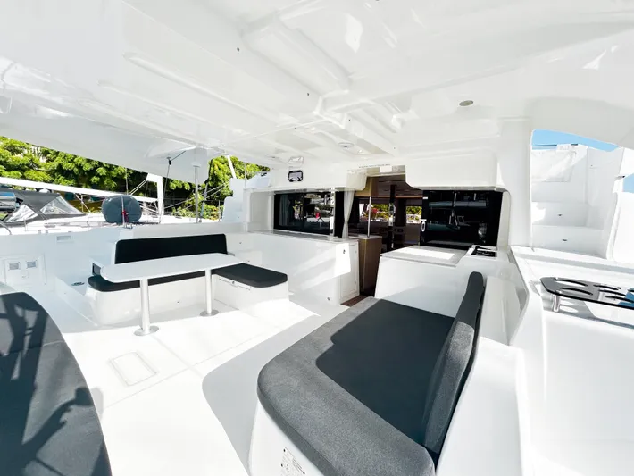 Southern Isle Yacht Photos Pics Interior of 2024 Lagoon 46 yacht with modern seating.