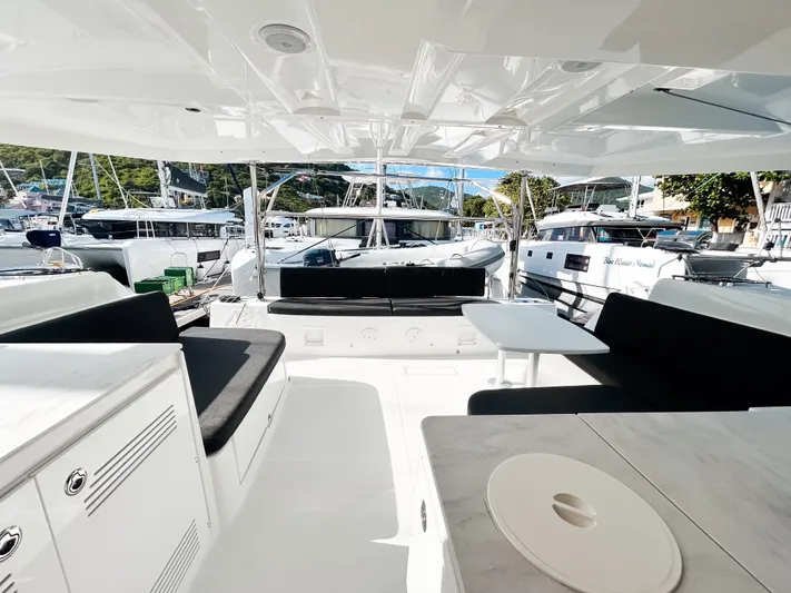 Southern Isle Yacht Photos Pics Interior view of 2024 Lagoon 46 yacht with luxurious seating.