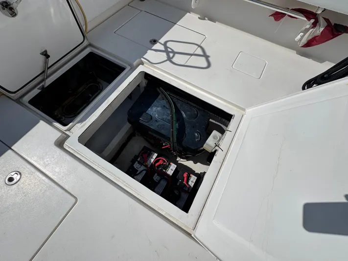  Yacht Photos Pics 2021 Contender 39 Fisharound boat battery compartment with open hatch.