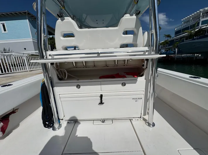  Yacht Photos Pics 2021 Contender 39 Fisharound boat interior with storage compartment and seating.