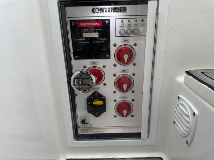  Yacht Photos Pics Control panel of 2021 Contender 39 Fisharound boat with switches and indicators.