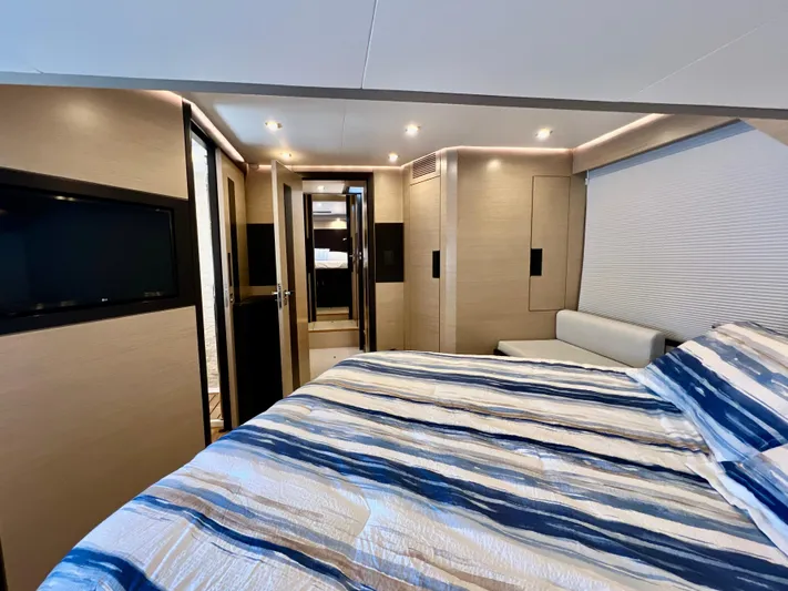  Yacht Photos Pics Luxurious bedroom interior of 2022 OKEAN Flybridge 50 yacht with modern design.