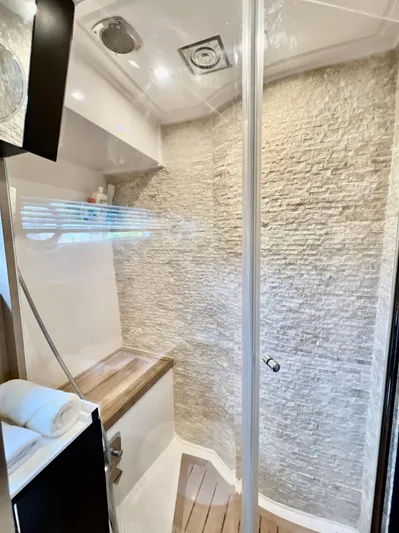  Yacht Photos Pics Modern shower area in the 2022 OKEAN Flybridge 50 yacht.