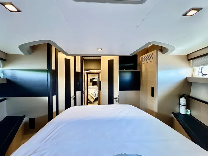  Yacht Photos Pics Luxurious bedroom interior of 2022 OKEAN Flybridge 50 yacht with modern design.
