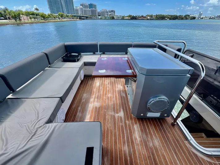  Yacht Photos Pics Flybridge seating area on 2022 OKEAN Flybridge 50 yacht with waterfront view.