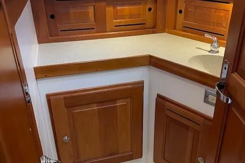 Alegria Yacht Photos Pics Wooden cabinetry and countertop in 2007 Tartan 4400 yacht interior.