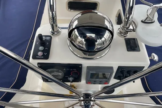 Alegria Yacht Photos Pics Control panel of a 2007 Tartan 4400 yacht with navigation instruments.