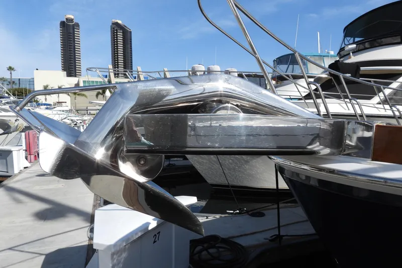  Yacht Photos Pics 2015 Grand Banks 46 Eastbay SX yacht with polished anchor at marina.