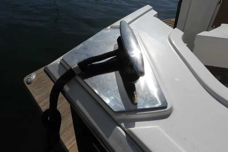  Yacht Photos Pics 2015 Grand Banks 46 Eastbay SX boat cleat with rope on deck.