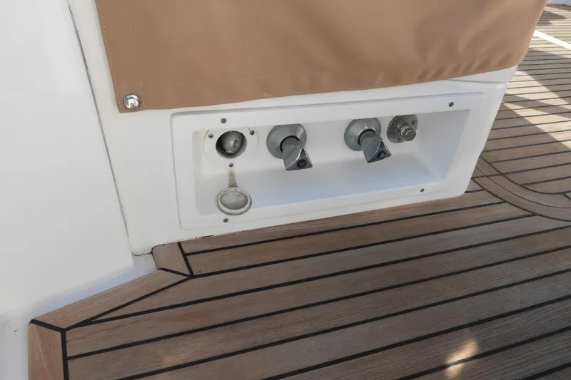  Yacht Photos Pics Control panel on teak deck of 2015 Grand Banks 46 Eastbay SX yacht.