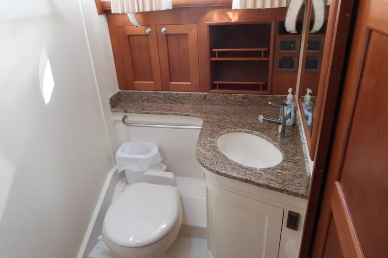  Yacht Photos Pics Luxurious bathroom in 2015 Grand Banks 46 Eastbay SX yacht with granite countertop.