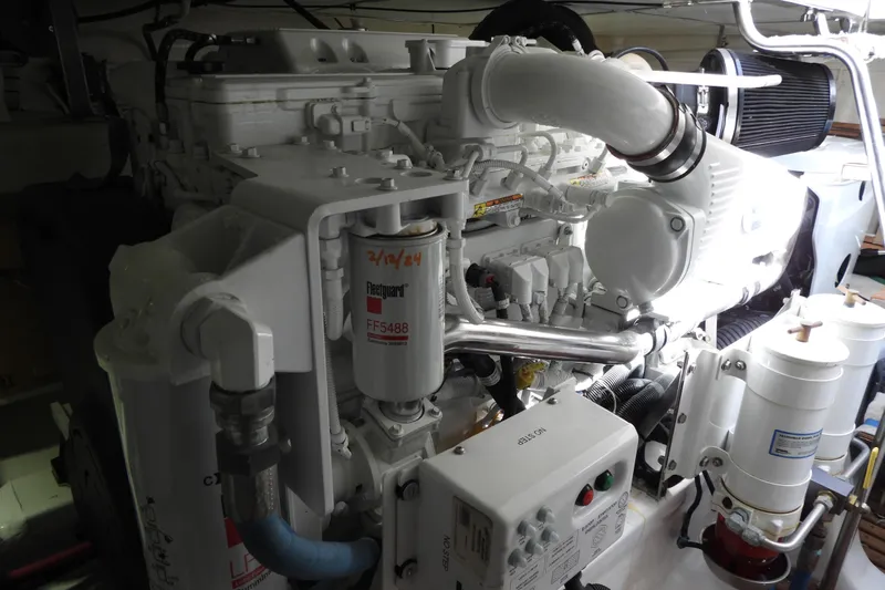  Yacht Photos Pics Engine room of 2015 Grand Banks 46 Eastbay SX yacht, showcasing detailed machinery.