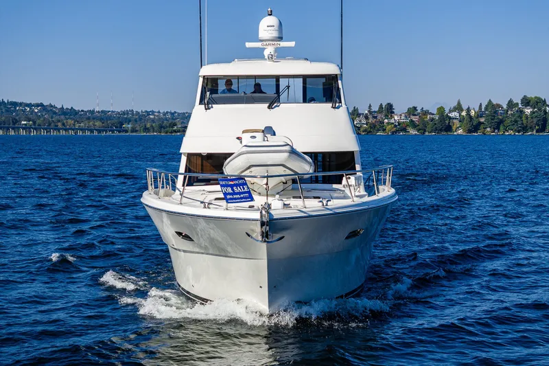 True North Yacht Photos Pics 2020 Maritimo 59 Motoryacht for sale on blue water, front view.