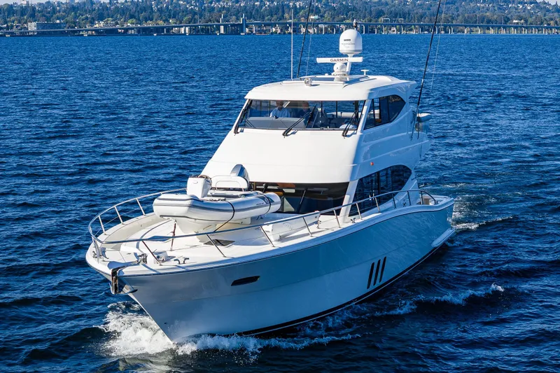 True North Yacht Photos Pics 2020 Maritimo 59 Motoryacht cruising on open water, showcasing sleek design and luxury.