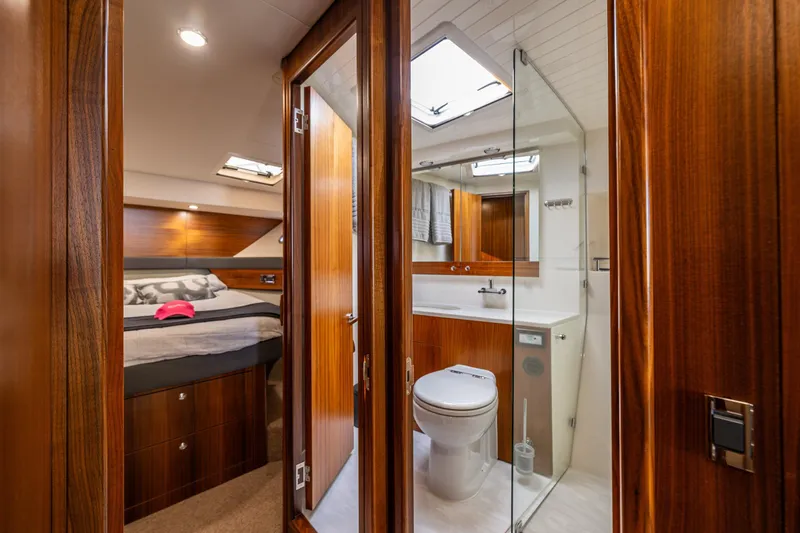 True North Yacht Photos Pics Luxurious interior of 2020 Maritimo 59 Motoryacht featuring bedroom and bathroom.