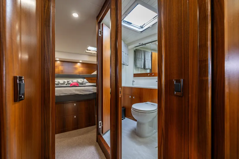 True North Yacht Photos Pics Luxurious interior of 2020 Maritimo 59 Motoryacht featuring bedroom and bathroom.