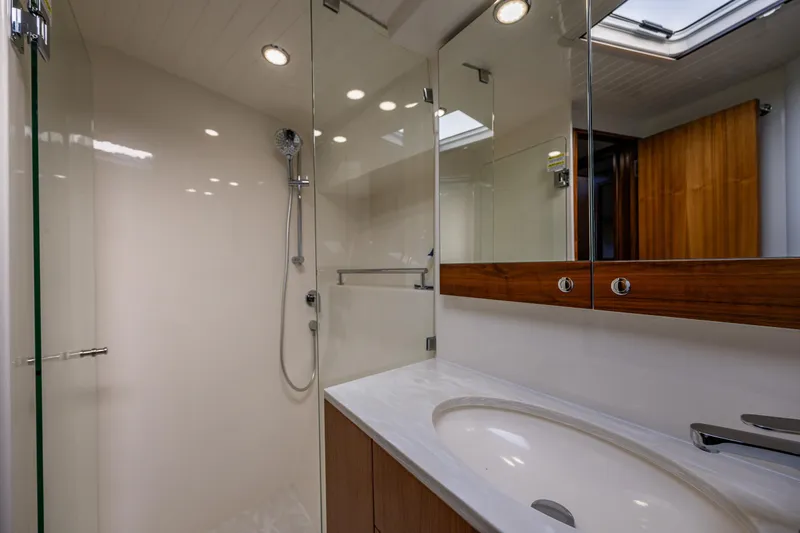 True North Yacht Photos Pics Luxurious bathroom in 2020 Maritimo 59 Motoryacht with modern fixtures and elegant design.