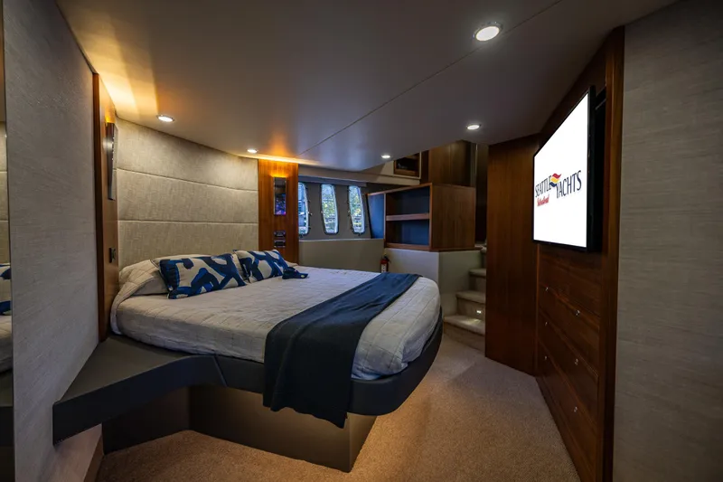 True North Yacht Photos Pics Luxurious bedroom interior of 2020 Maritimo 59 Motoryacht with modern design and cozy ambiance.