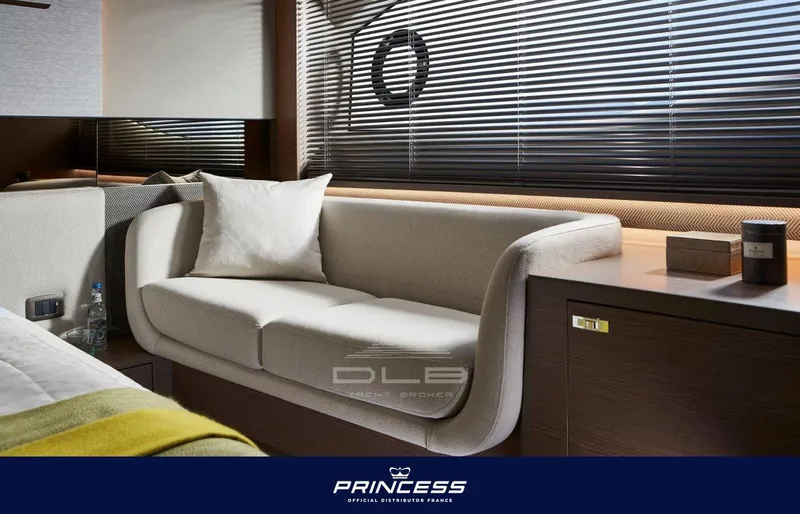  Yacht Photos Pics Luxurious interior of 2024 Princess V55 yacht with elegant sofa and modern decor.