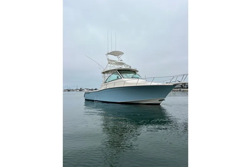 Be Chumming Yacht Photos Pics 2018 Grady-White Express 370 boat on calm water, overcast sky.